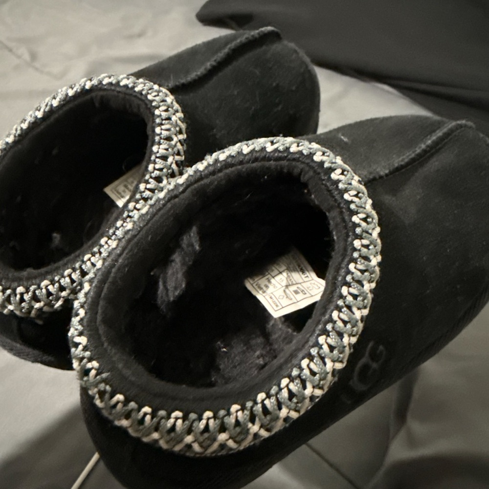 UGG Black Slippers with Metallic Trim some of the sticking came off